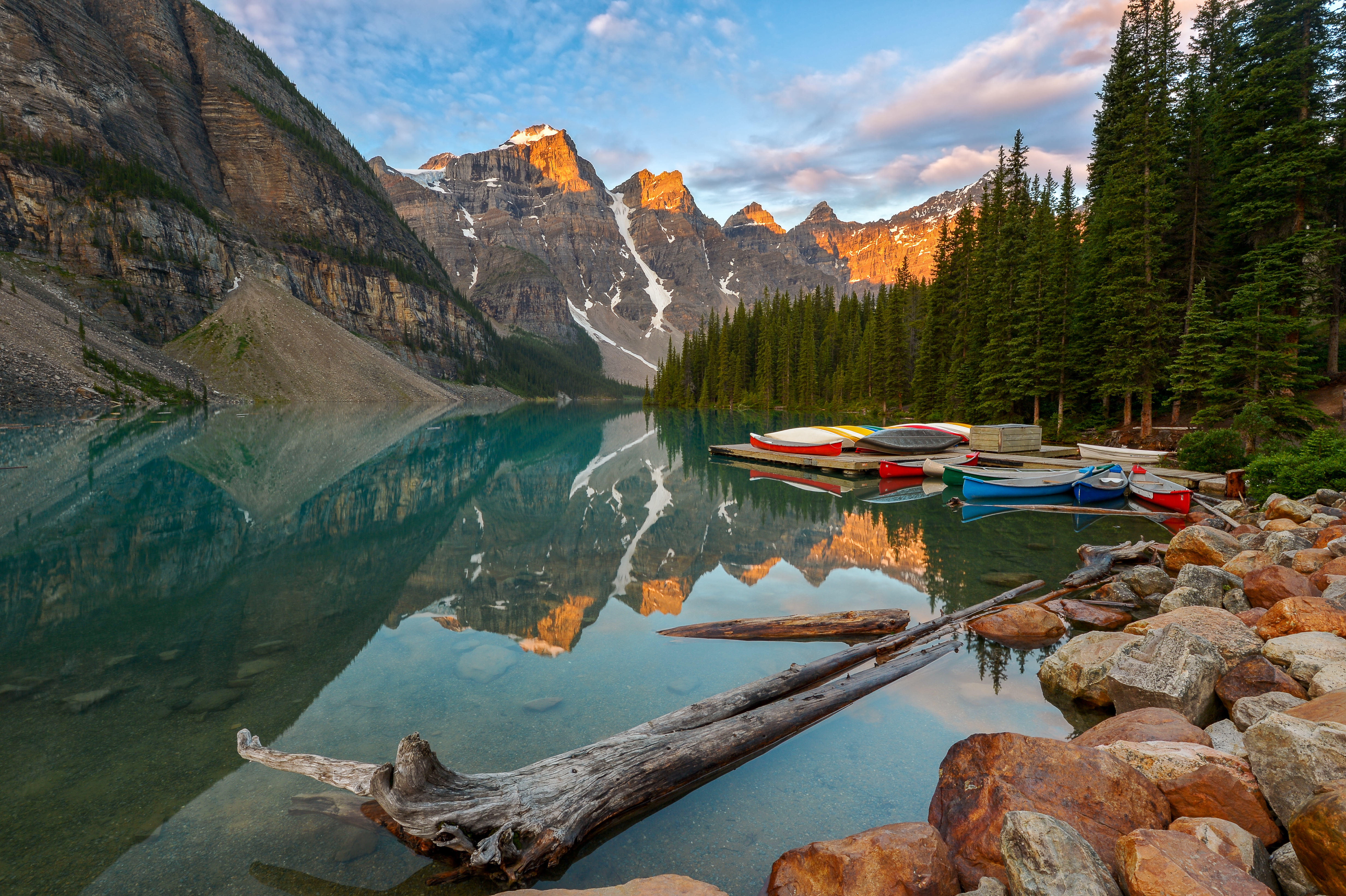 Early morning calm on the shores of Moraine Lake, one of the crown jewels of the Canadian Rockies!